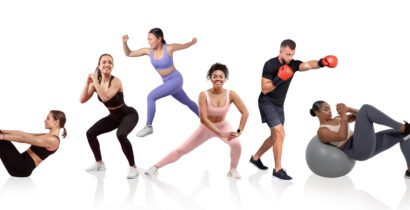“Personal trainer helping a client reach their fitness goals in 2025.”